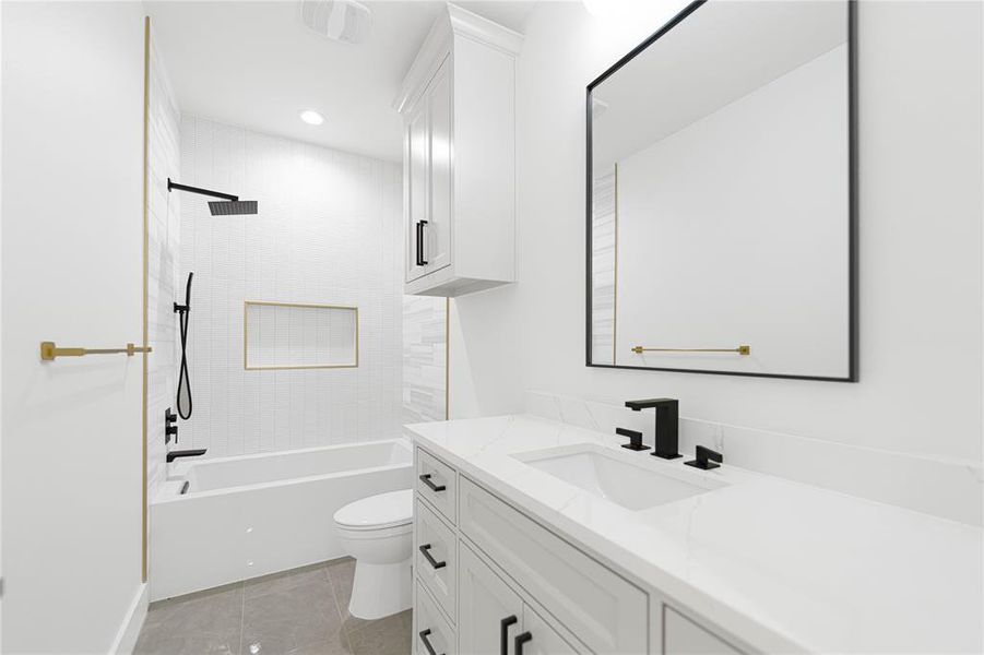 Full bathroom featuring vanity, bathing tub / shower combination, recessed lighting, and light tile patterned floors