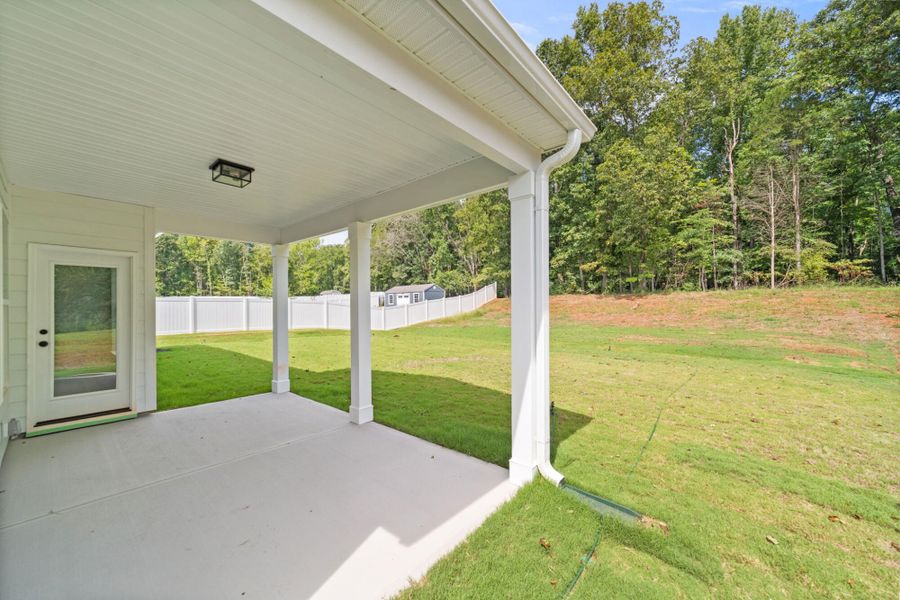 Exterior details and patio area of a home in Fiddler's Ridge, Advance (Image 2).