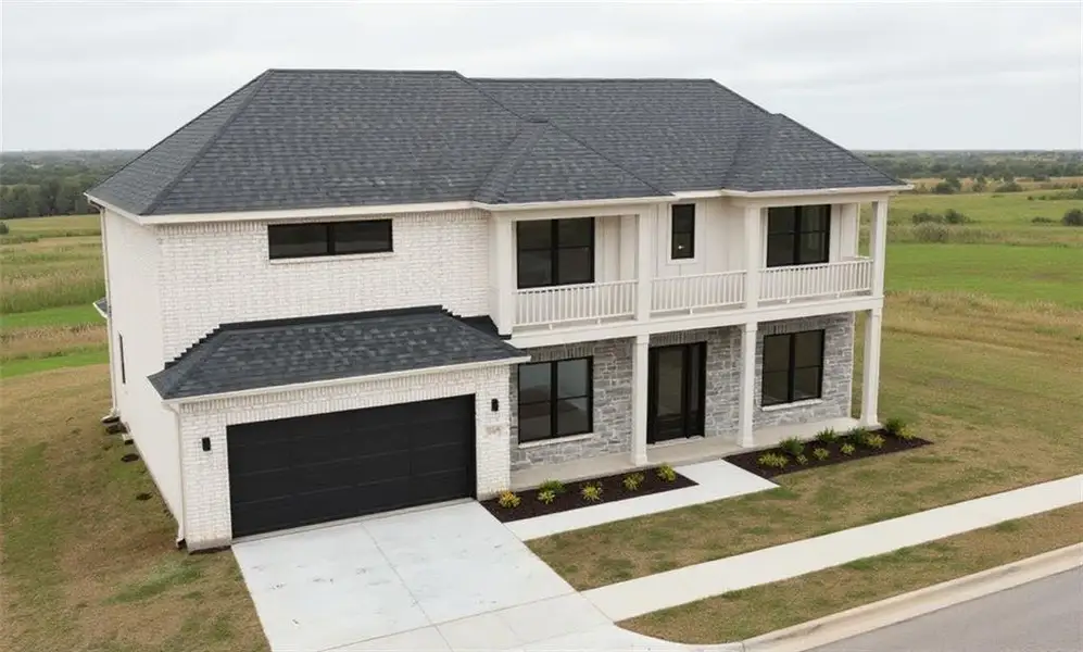 Front exterior of a new home in , Buford, GA, highlighting curb appeal (Image 6).