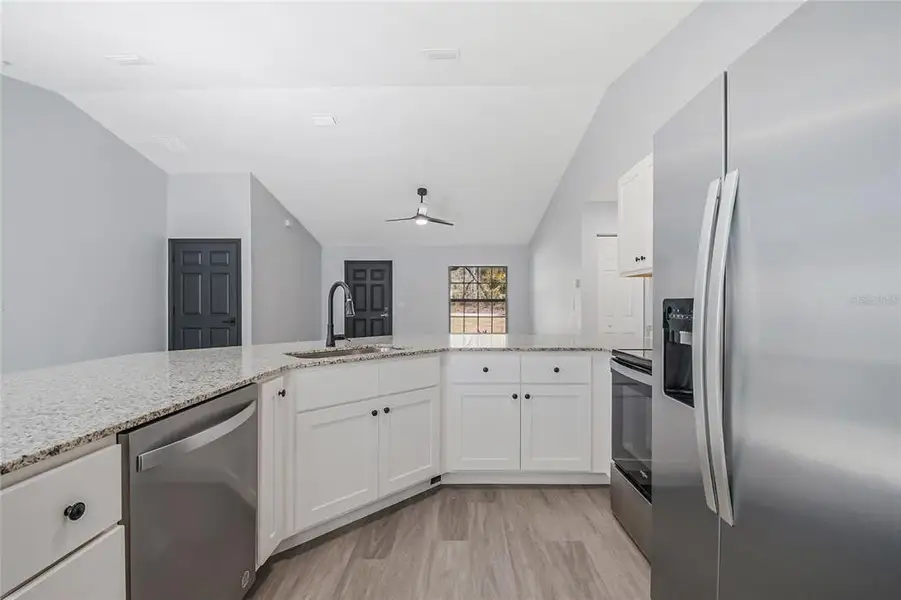 Furnished interior view inside a new home in , Dunnellon (Image 7).