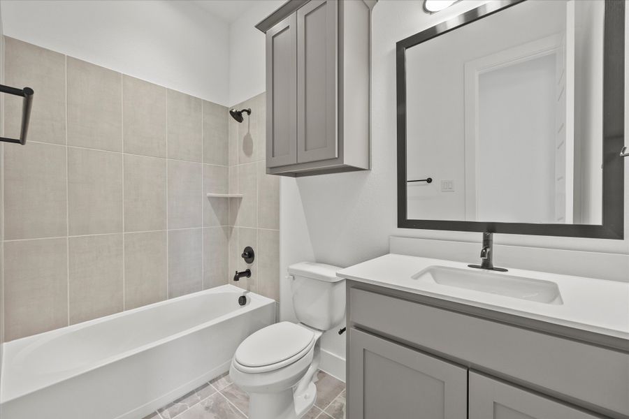 Representative furnished interior of a home built from the Davenport by Windsor Homes in Winding Creek, Rockwall (Image 14).