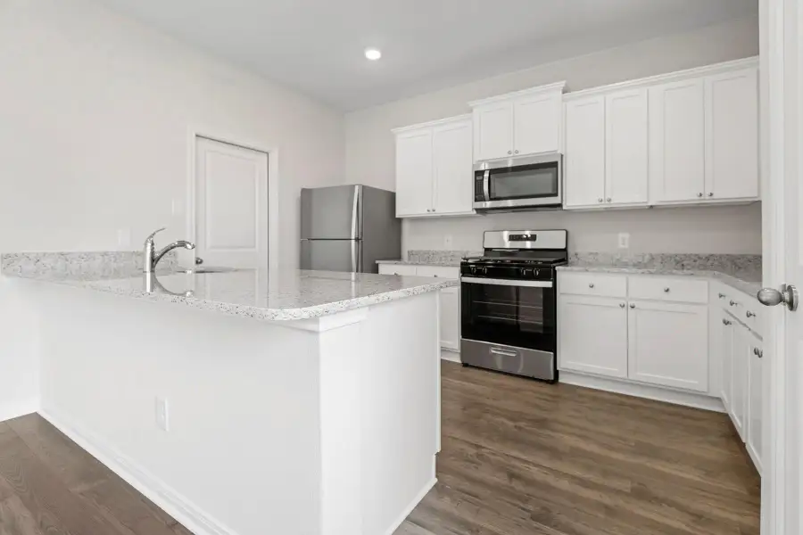 Furnished interior view inside a new home in Cypress Trails at Bauer Landing, Hockley (Image 6).
