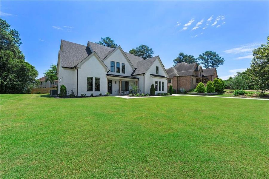 Front exterior of a new home in , Dacula, GA, highlighting curb appeal (Image 20).