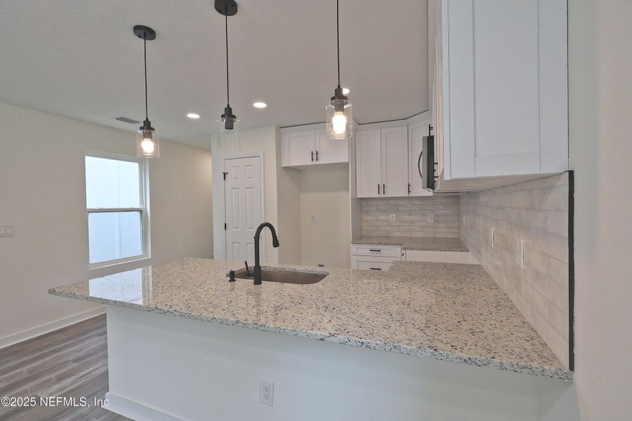 Furnished interior view inside a new home in , Jacksonville (Image 11). Furnished interior view inside a new home in , Jacksonville (Image 11).