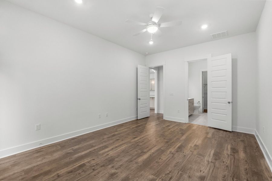 Spacious, unfurnished interior of a new home in Long Bay Golf Club, Longs (Image 28).