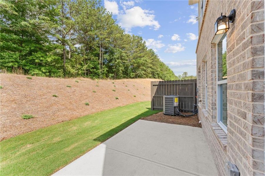Exterior details and patio area of a home in Wildwood Place, Powder Springs (Image 22). Exterior details and patio area of a home in Wildwood Place, Powder Springs (Image 22).