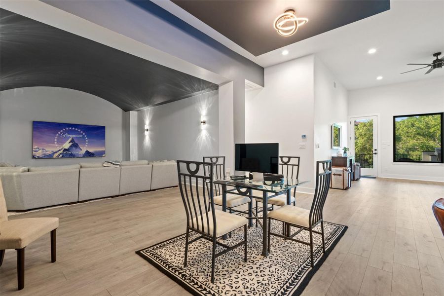 Designed for unforgettable entertaining, the lower level features a barrel-ceiling home theater, expansive game room, stylish bar, and temperature-controlled wine cellar.