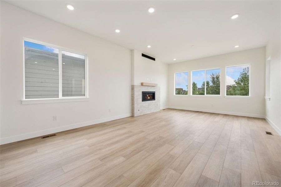 Spacious, unfurnished interior of a new home in Festival at RainDance, Windsor (Image 11).