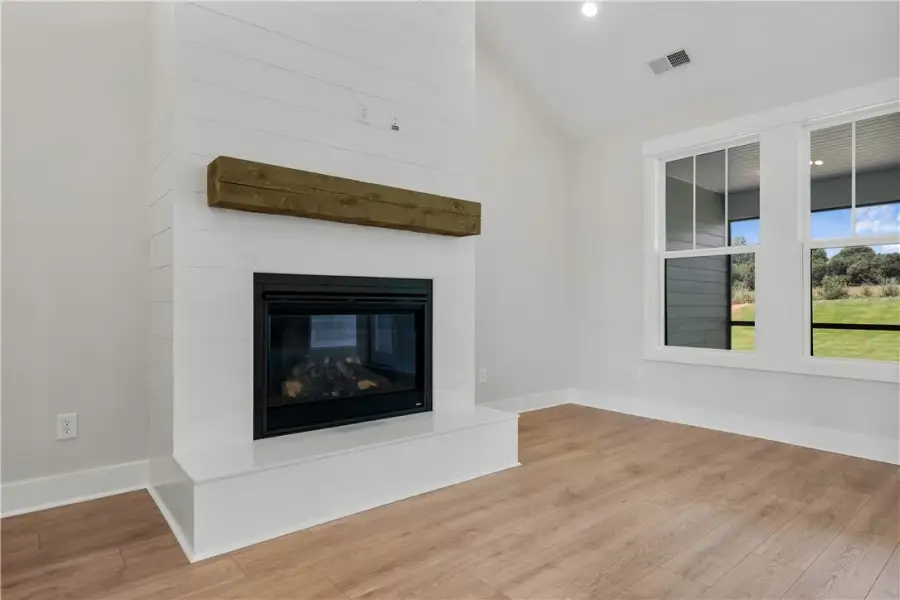 A striking fireplace with a shiplap surround ancho A striking fireplace with a shiplap surround ancho