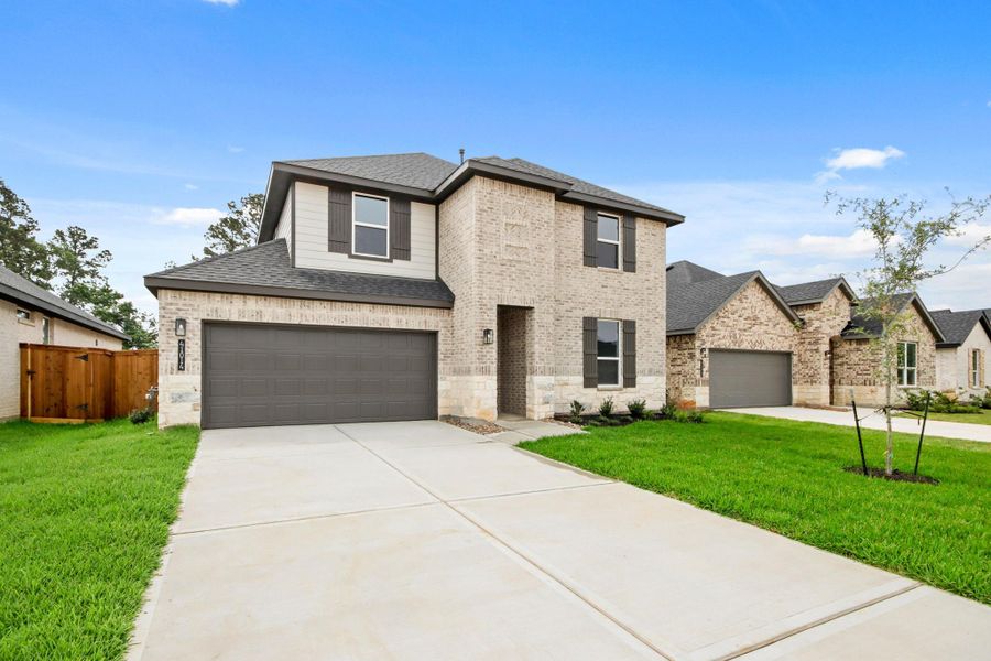 Front exterior of a new home in Mill Creek Estates, Magnolia, TX, highlighting curb appeal (Image 19).