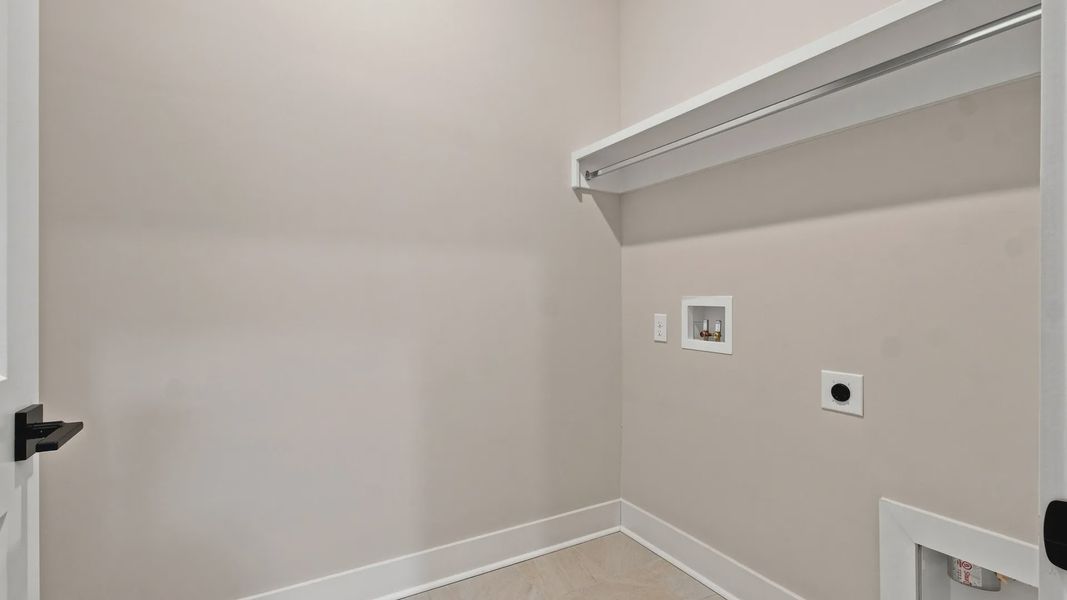 Upstairs closet rack and storage options.