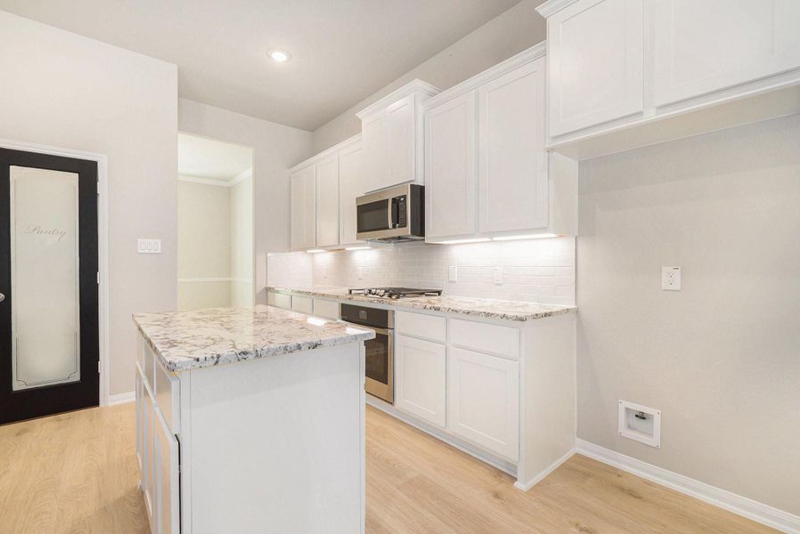 Furnished interior view inside a new home in , Bay City (Image 9).