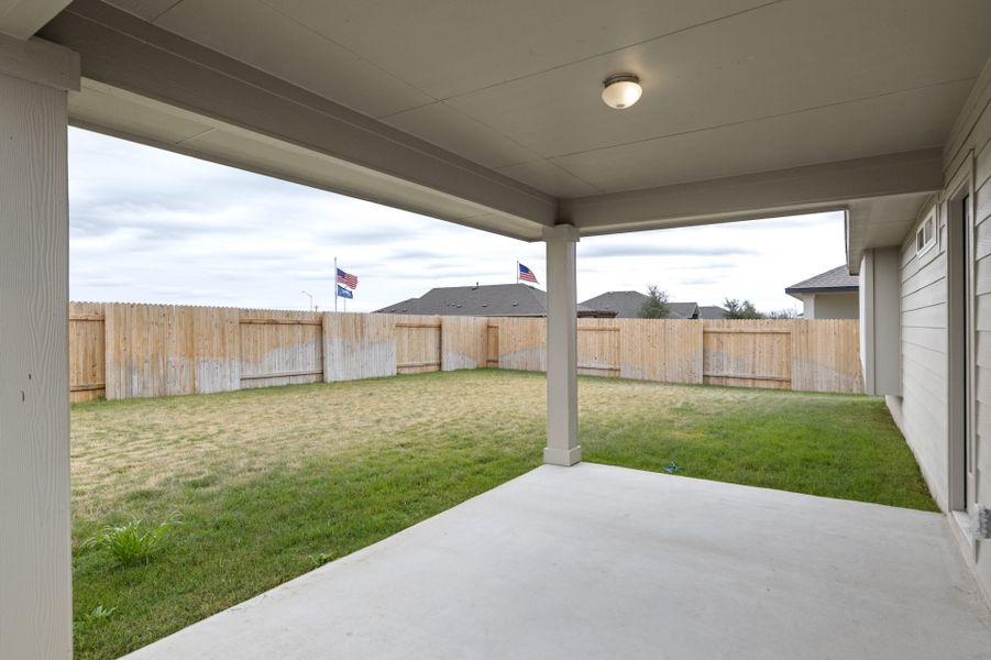 Exterior details and patio area of a home in Village at Three Oaks, Seguin (Image 20).