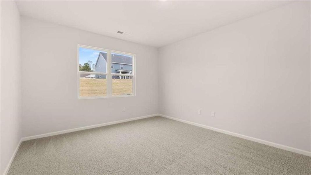 Spacious, unfurnished interior of a new home in Brooks Station, Dacula (Image 20).