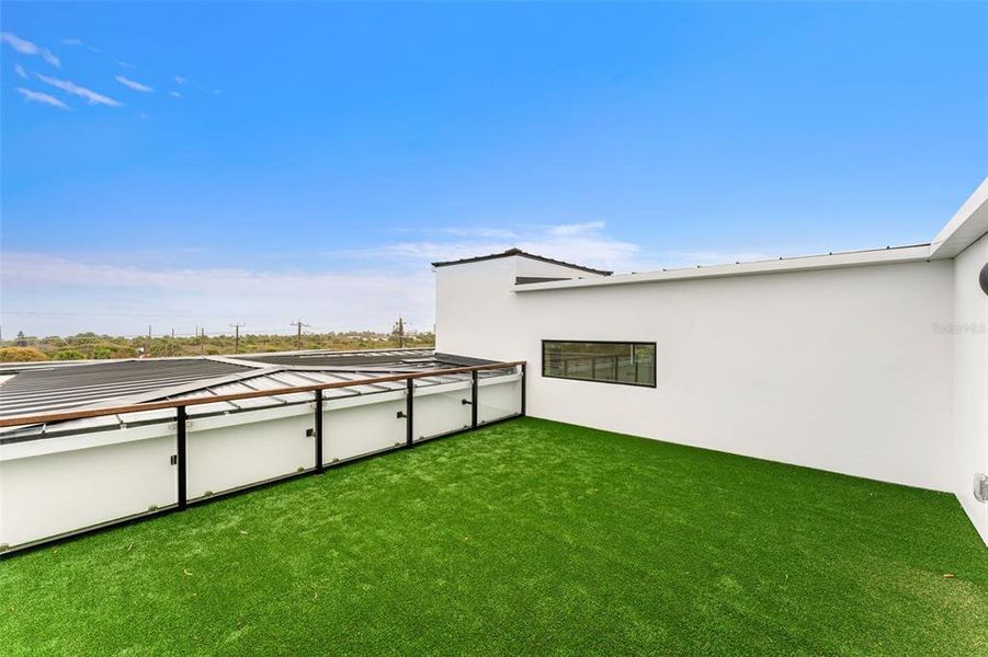 Exterior details and patio area of a home in , New Smyrna Beach (Image 38).