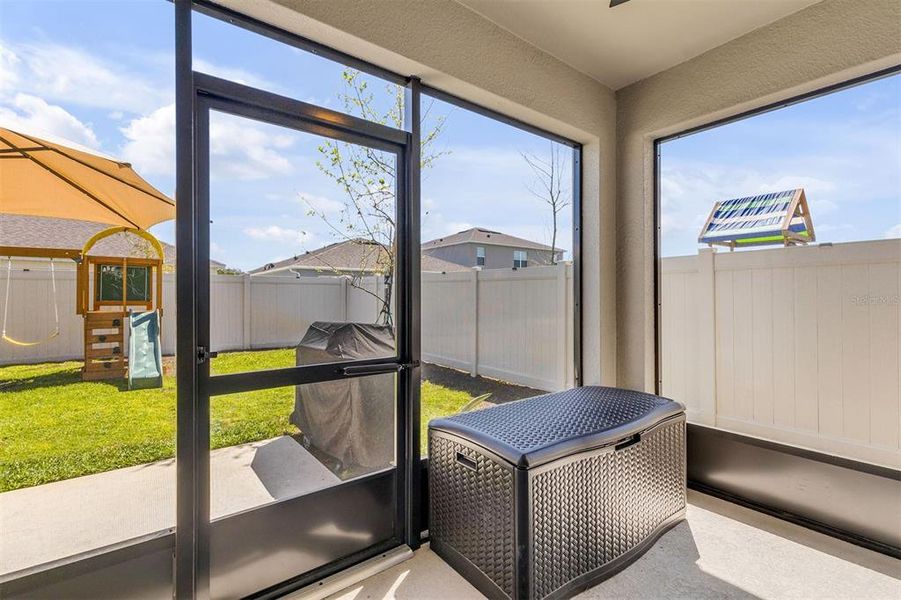 Exterior details and patio area of a home in Groveside at Ormond Station, Ormond Beach (Image 3).