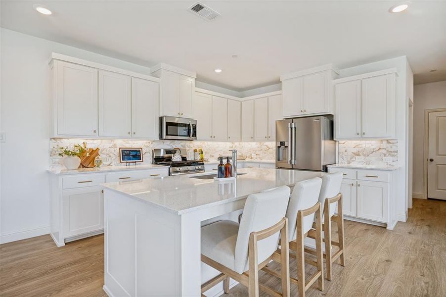 Furnished interior view inside a new home in Painted Tree - Woodland District, McKinney (Image 6).
