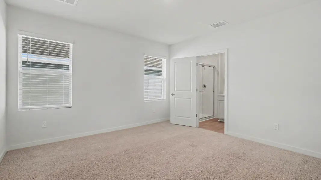 Spacious, unfurnished interior of a new home in Venetian Grove, Vero Beach (Image 14).