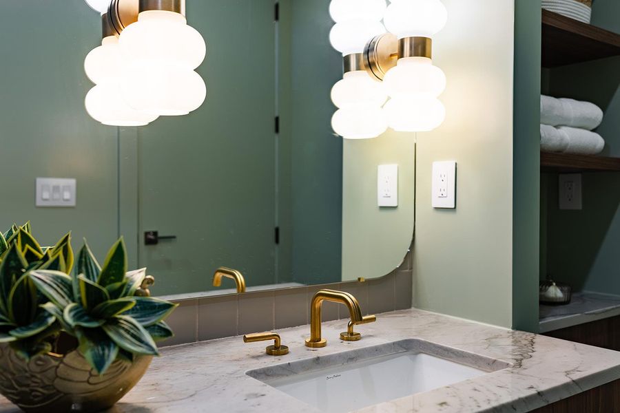 Secondary baths pop with style and color. Secondary baths pop with style and color.