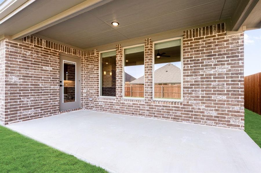 Exterior details and patio area of a home in Timberbrook, Justin (Image 21).