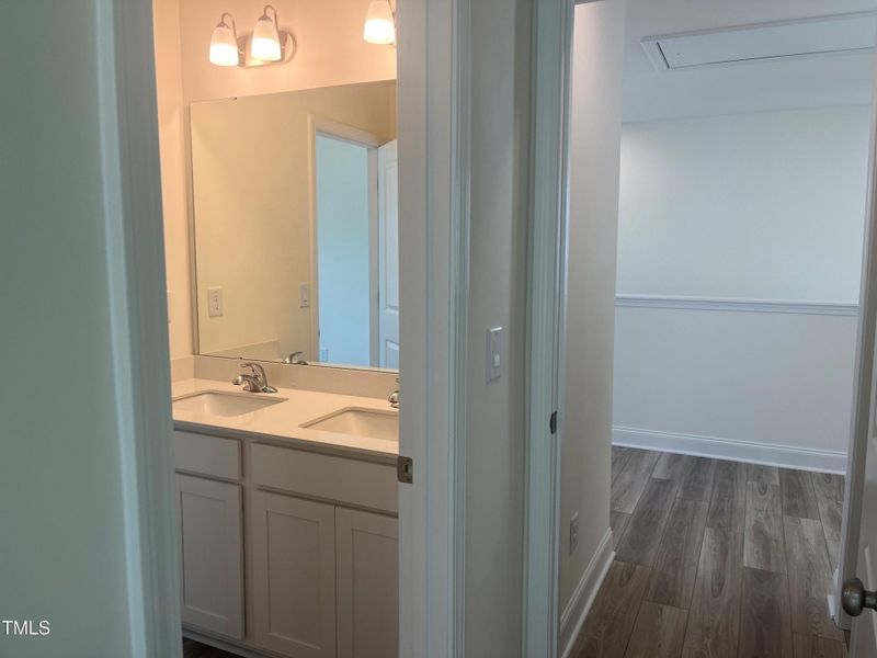 Hallway leading into Jack and Jill Bath