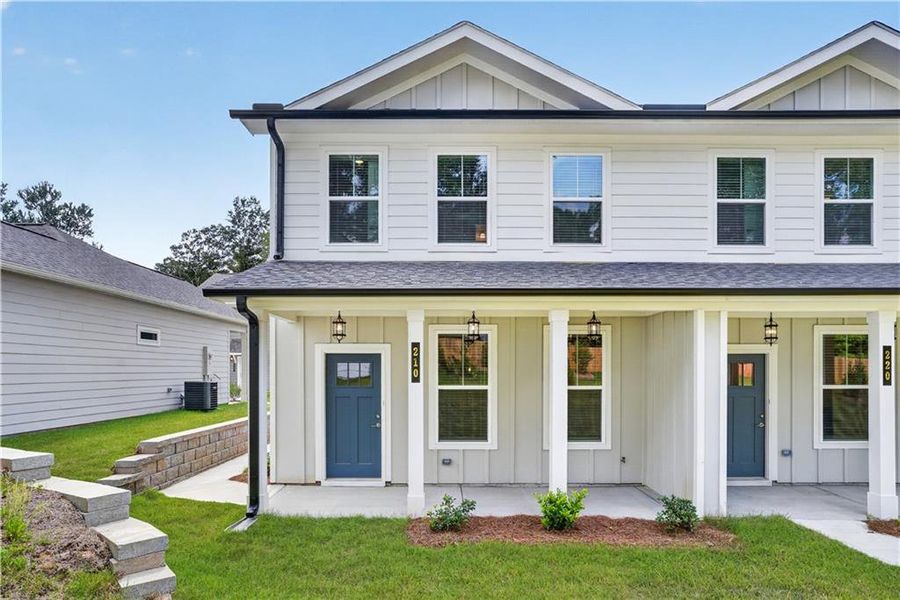 Exterior details and patio area of a home in The Cottages at East Lanier, Fayetteville (Image 3).