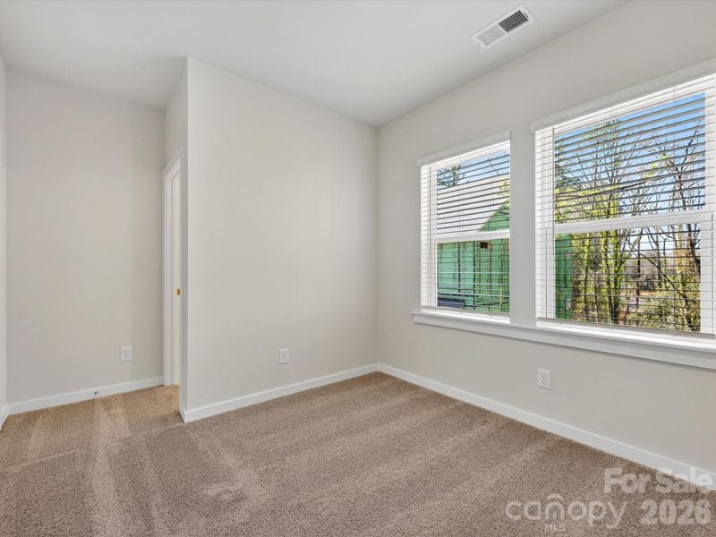 Spacious, unfurnished interior of a new home in Central Living at Craig, Charlotte (Image 26).