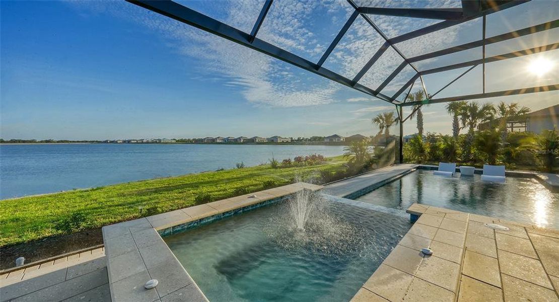 Exterior details and patio area of a home in Wild Blue at Waterside, Sarasota (Image 36).