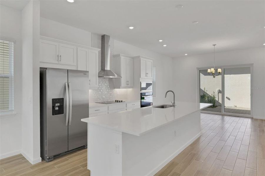 Furnished interior view inside a new home in Serenade at Ovation, Winter Garden (Image 13).