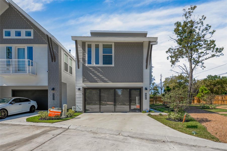 Front exterior of a new home in , Houston, TX, highlighting curb appeal (Image 1).