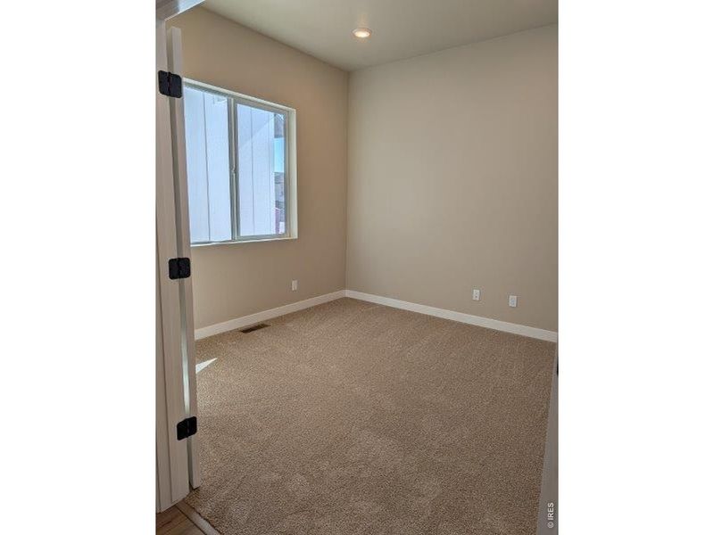 Spacious, unfurnished interior of a new home in Highlands Preserve, Mead (Image 11).