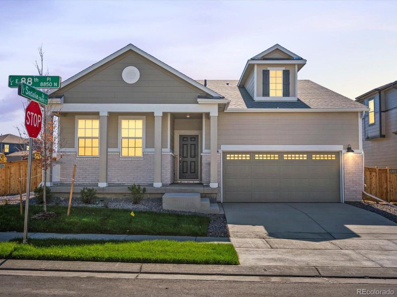 Front exterior of a new home in , Commerce City, CO, highlighting curb appeal (Image 1). Front exterior of a new home in , Commerce City, CO, highlighting curb appeal (Image 1).