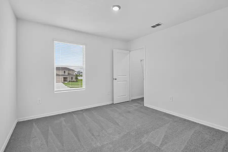 Representative unfurnished interior of a home built from the Kingfisher by Taylor Morrison in Palm Wind, Hudson (Image 15).