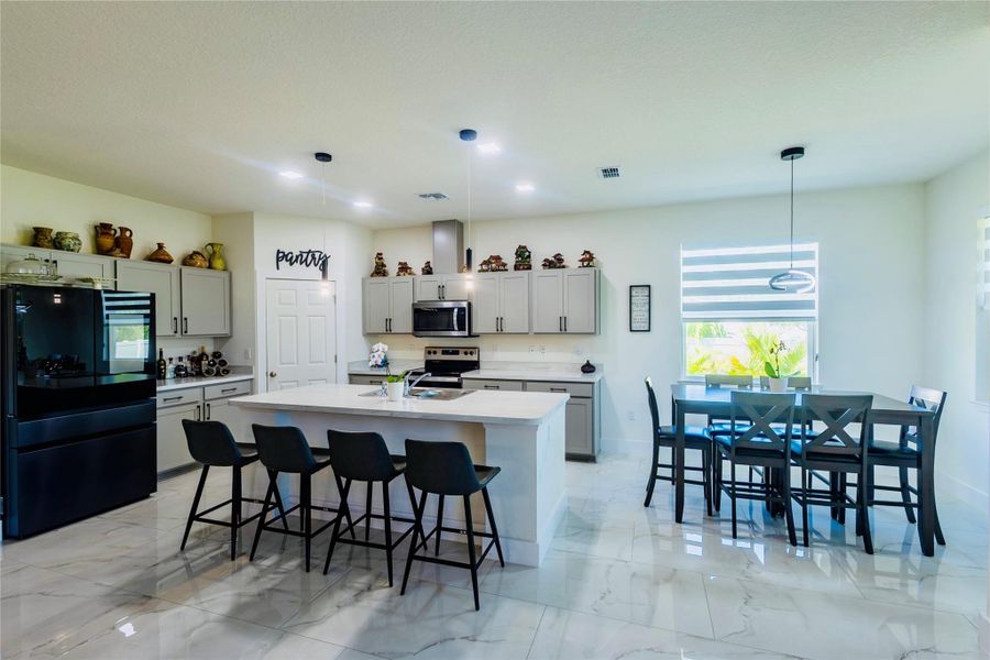 Furnished interior view inside a new home in , Port St. Lucie (Image 16).