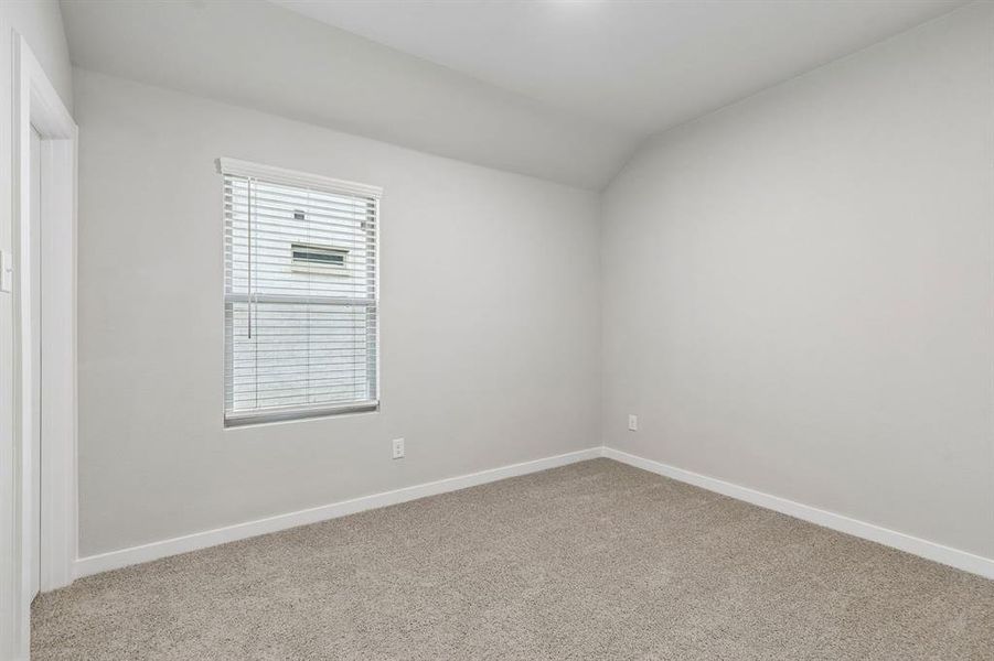 Bedroom in the Emmy II home plan by Trophy Signature Homes - REPRESENTATIVE PHOTO