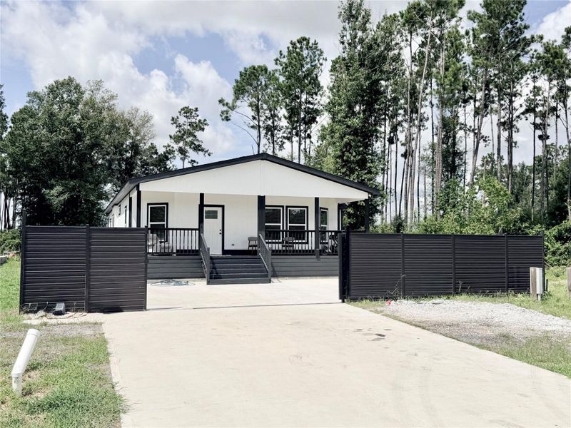 Front exterior of a new home in , Cleveland, TX, highlighting curb appeal (Image 1). Front exterior of a new home in , Cleveland, TX, highlighting curb appeal (Image 1).