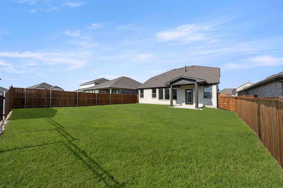 Exterior details and patio area of a home in Devonshire 50s, Forney (Image 18). Exterior details and patio area of a home in Devonshire 50s, Forney (Image 18).