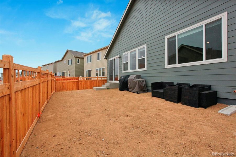 Exterior details and patio area of a home in Brighton Crossings, Brighton (Image 3).