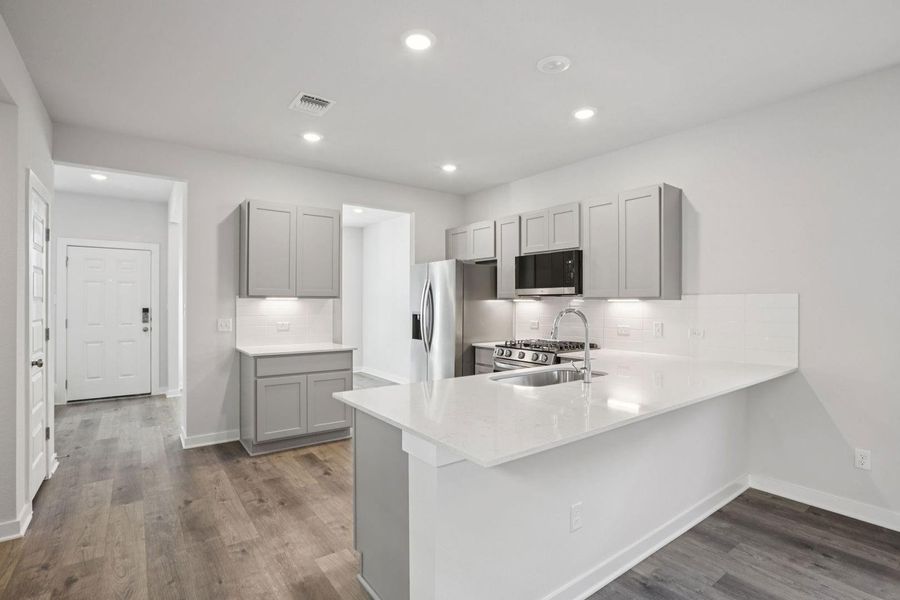 Furnished interior view inside a new home in Avery Centre, Round Rock (Image 9).