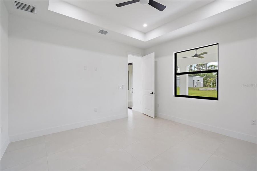 Spacious, unfurnished interior of a new home in , Port Charlotte (Image 31).