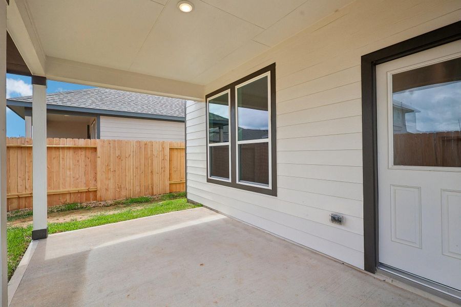 Exterior details and patio area of a home in Bluestem, Brookshire (Image 24). Exterior details and patio area of a home in Bluestem, Brookshire (Image 24).