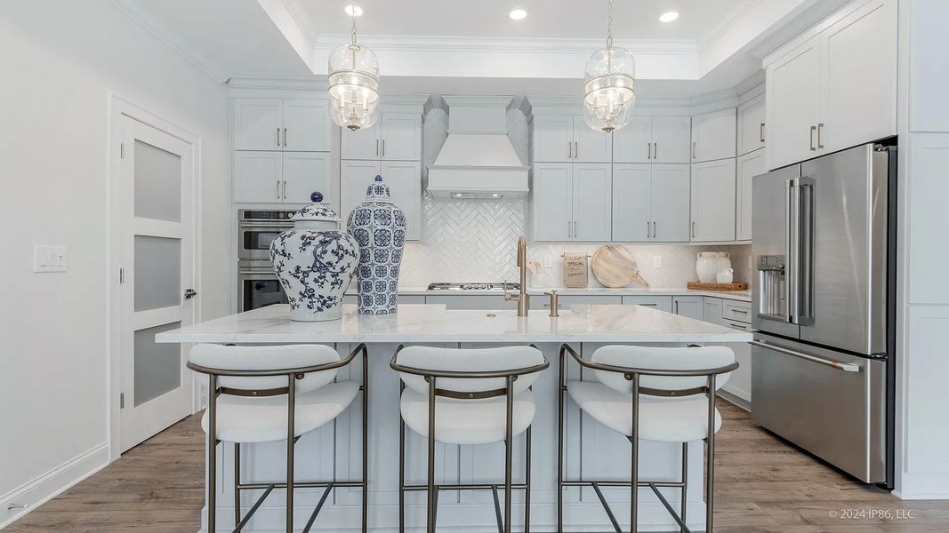 Representative furnished interior of a home built from the Promenade by Epcon Communities in The Courtyards by The Manor, Alpharetta (Image 17).