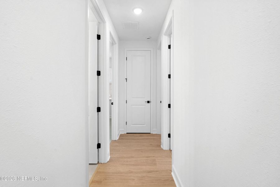 Spacious, unfurnished interior of a new home in TrailMark, St. Augustine (Image 21).