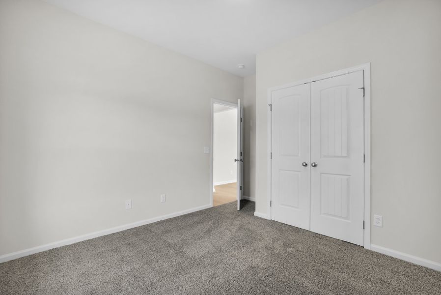 Representative unfurnished interior of a home built from the The Magnolia by Smith Family Homes in Sweetwater, Brunswick (Image 28).