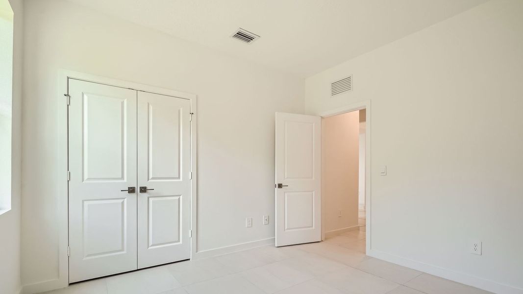 Representative unfurnished interior of a home built from the Delray by D.R. Horton in Twin Oaks, Stuart (Image 22).