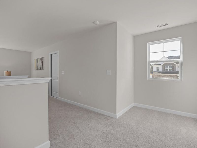 Spacious, unfurnished interior of a new home in Woodland Crossing, Zebulon (Image 21).