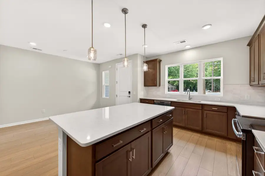 Furnished interior view inside a new home in Amplitude, Charlotte (Image 8).