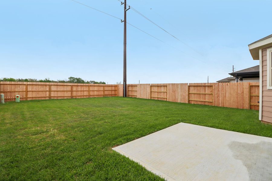 Exterior details and patio area of a home in Bauer Meadows, Hockley (Image 3).