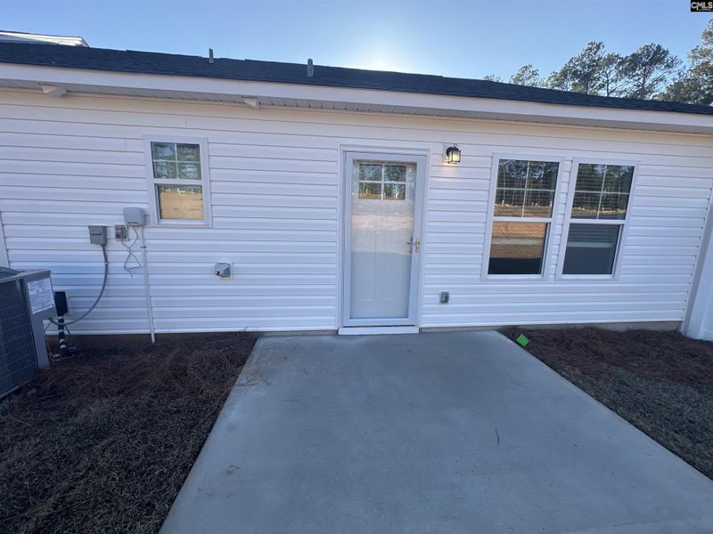 Exterior details and patio area of a home in Piney Woods Bluff, Columbia (Image 4).