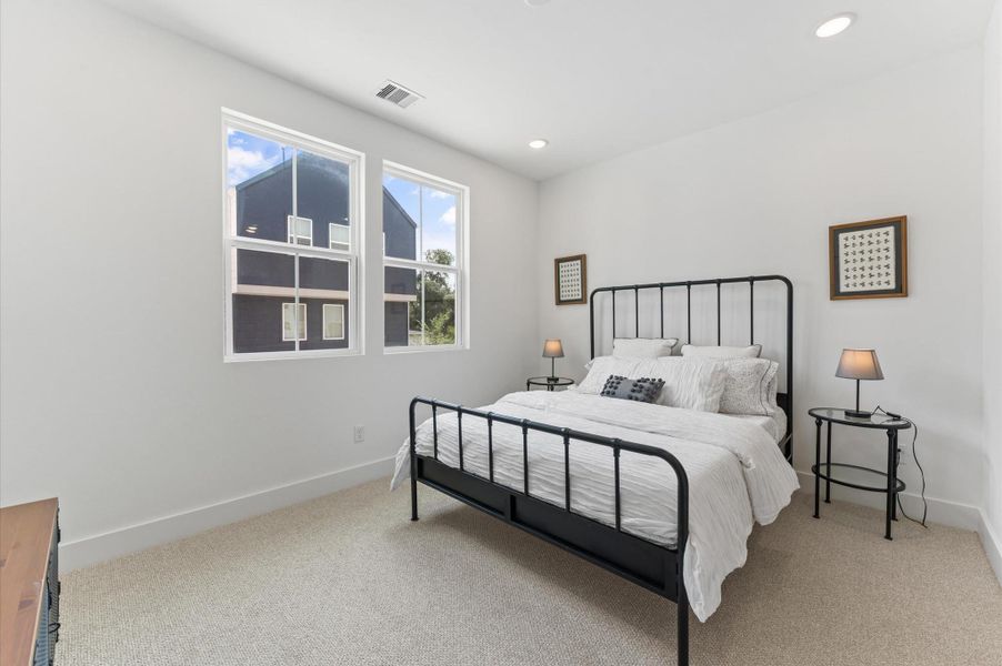 This charming secondary bedroom connects to a thoughtfully designed Jack and Jill bathroom, offering both privacy and shared convenience. Ideal for siblings or guests, the room features soft natural light, plush carpeting, and a spacious closet. The adjoining bathroom includes dual vanities, a tub-shower combo, and separate entrances from two bedrooms—making morning routines a breeze while maintaining personal space. A smart layout that blends function, style, and flexibility. This charming secondary bedroom connects to a thoughtfully designed Jack and Jill bathroom, offering both privacy and shared convenience. Ideal for siblings or guests, the room features soft natural light, plush carpeting, and a spacious closet. The adjoining bathroom includes dual vanities, a tub-shower combo, and separate entrances from two bedrooms—making morning routines a breeze while maintaining personal space. A smart layout that blends function, style, and flexibility.